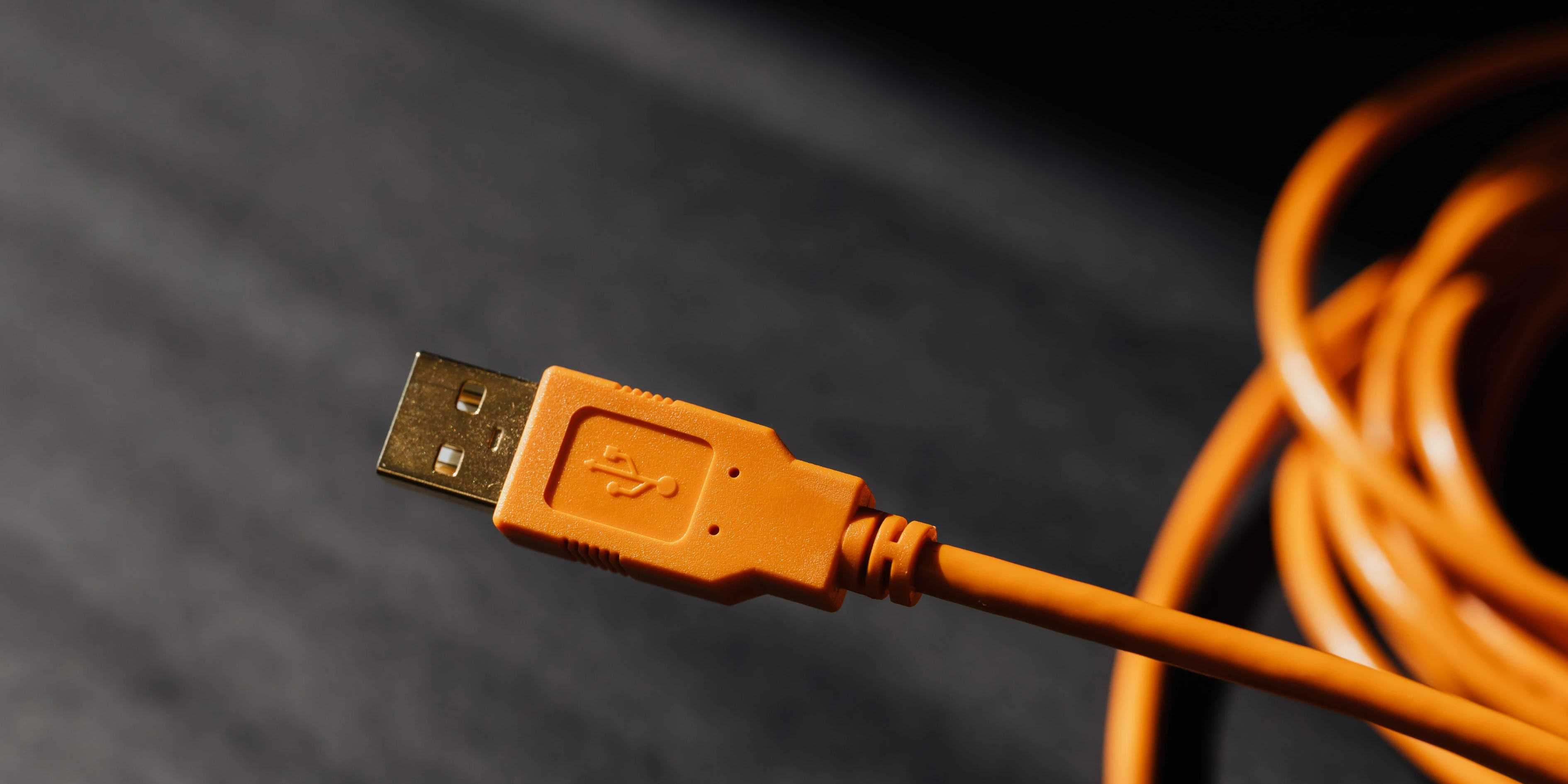 Multiple charging cables neatly coiled